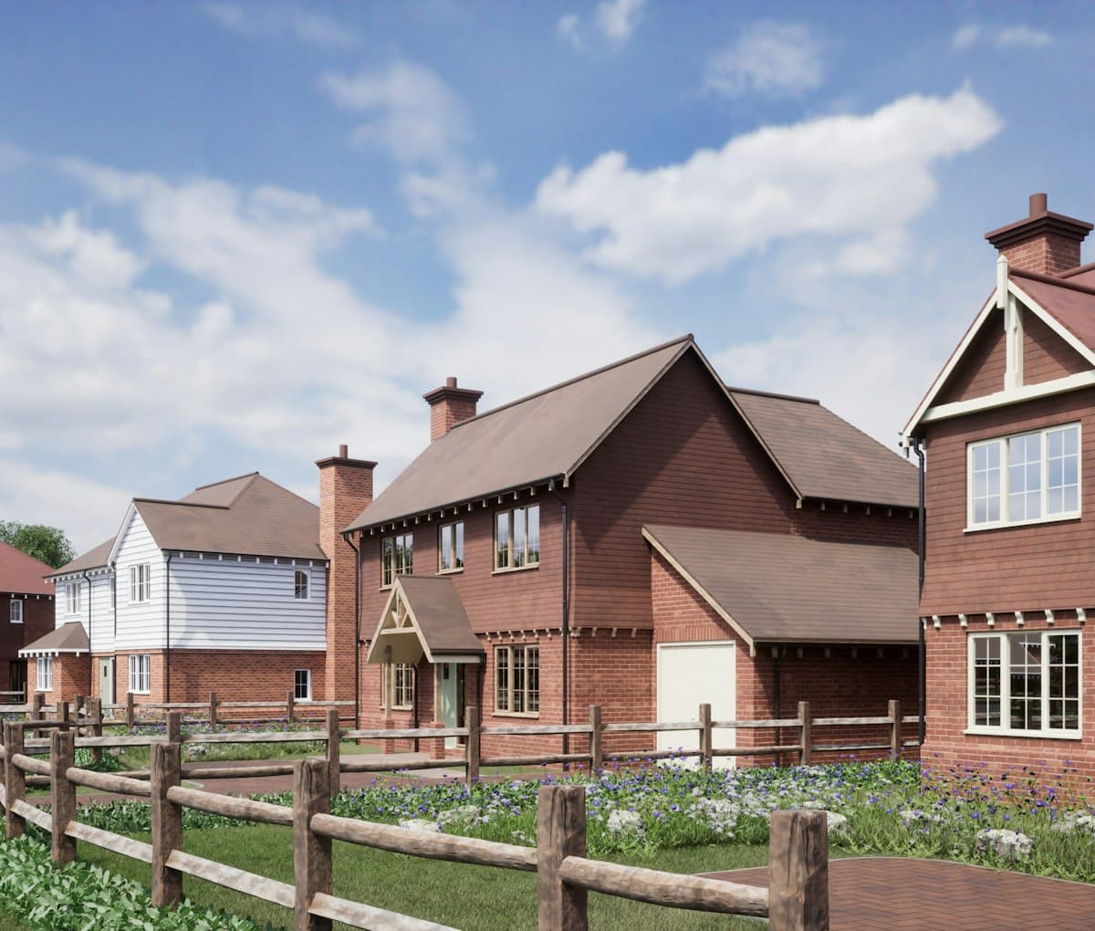 Street of new-build red-brick family homes